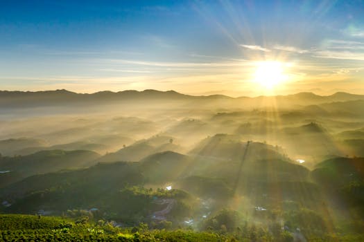 a beautiful nature scene with mountains and trees