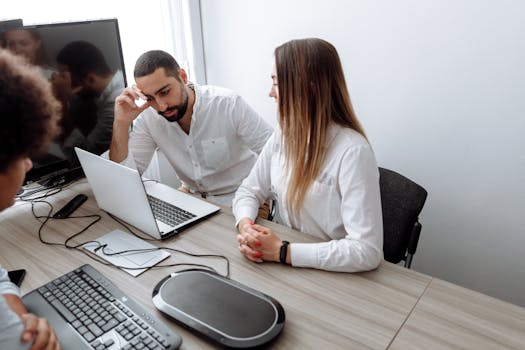 image of stressed professionals in an office