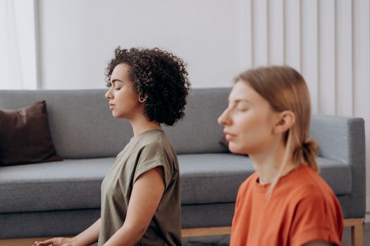 A calm workspace with a person practicing deep belly breathing