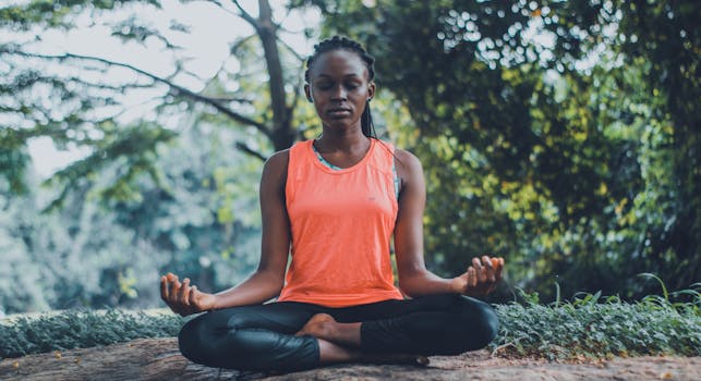 a person meditating with calming music