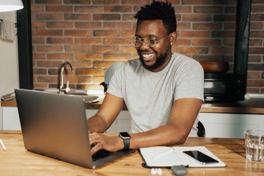 person working on a laptop with productivity apps