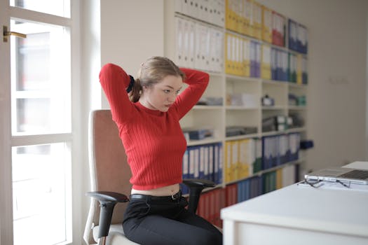 a person stretching in an office