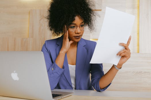 image of a stressed professional at a desk