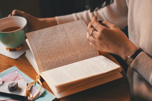 person writing in a journal